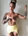 Sexy busty n tattooed MILF exposinf her fantastic body