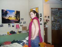 Amateur girl posing in her room