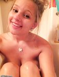Smiley amateur teen babe showing her tits