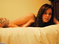 Slim amateur girl nude posing on bed
