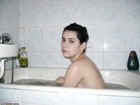 Amateur brunette naked at bath