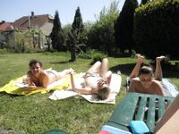 Four amateur GF sunbathing topless