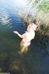 Eva naked at riverside