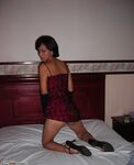 Hot brunette amateur wife posing on bed
