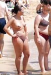 Amateur girls topless at beach