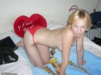 Blonde amateur wife posing on bed 2