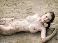 Beautiful amateur busty babe naked at riverside