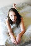 Teenage amateur GF posing on bed
