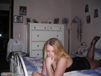 Blonde amateur wife posing on bed 3