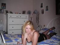 Blonde amateur wife posing on bed 3