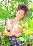Asian amateur girl posing naked outdoors