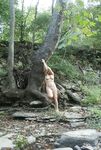 Two amateur GFs posing together naked at forest