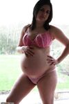 Pregnant housewife posing naked 3