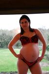 Pregnant housewife posing naked 3