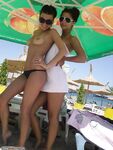 Two amateur teen GFs topless at beach 2