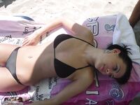 Two amateur teen GFs topless at beach 2