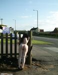 Nude posing on street