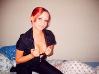 Sweet redhead GF nude posing and sucking
