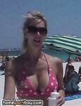 Tall and sexy MILF shows off her big tits