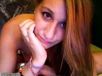 Pretty teen girl posing on webcam