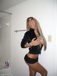 Sexy blond girl exposing her tanned body
