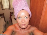 Amateur wife sunbathing topless 3