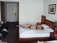 My wife posing nude on cam