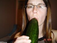 Miley put big cucumber in her pussy
