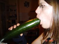 Miley put big cucumber in her pussy