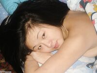 Cute asian teen exposed her tits