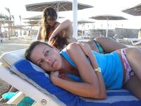 Amateur girl sunbathing topless 2