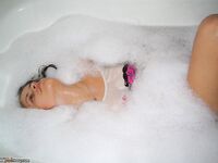 Cute amateur babe posing nude in bath
