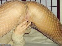 Blonde sex bomb in fishnets