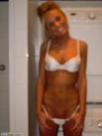 Sexy tanned blonde flashing tits