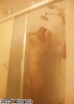 Kitty naked at shower