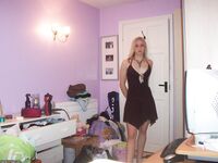 Teen blonde self shooting in pink room