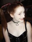 Gothic Red Headed Girl Flashes Her Tits