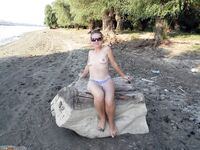 Skinny girl sunbathing naked