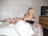 Blonde posing at hotel