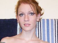 Redhead amateur GF with natural saggy tits