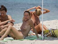 Amateur girl sunbathing topless 4
