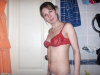 Young amateur wife posing at home 3