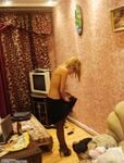 Blonde amateur wife posing at home 16