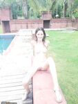 Cyntia posing near pool