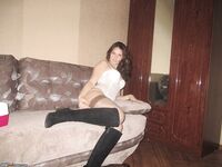 Russian amateur wife posing at home 8