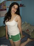 nerdy amateur girl posing and sucking
