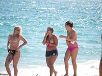 Topless girls at beach 2