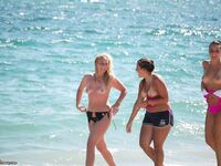 Topless girls at beach 2