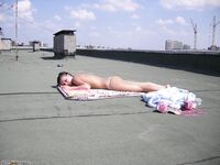 Two amateur GFs sunbathing topless 4