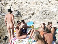 Nude group of girls on the beach